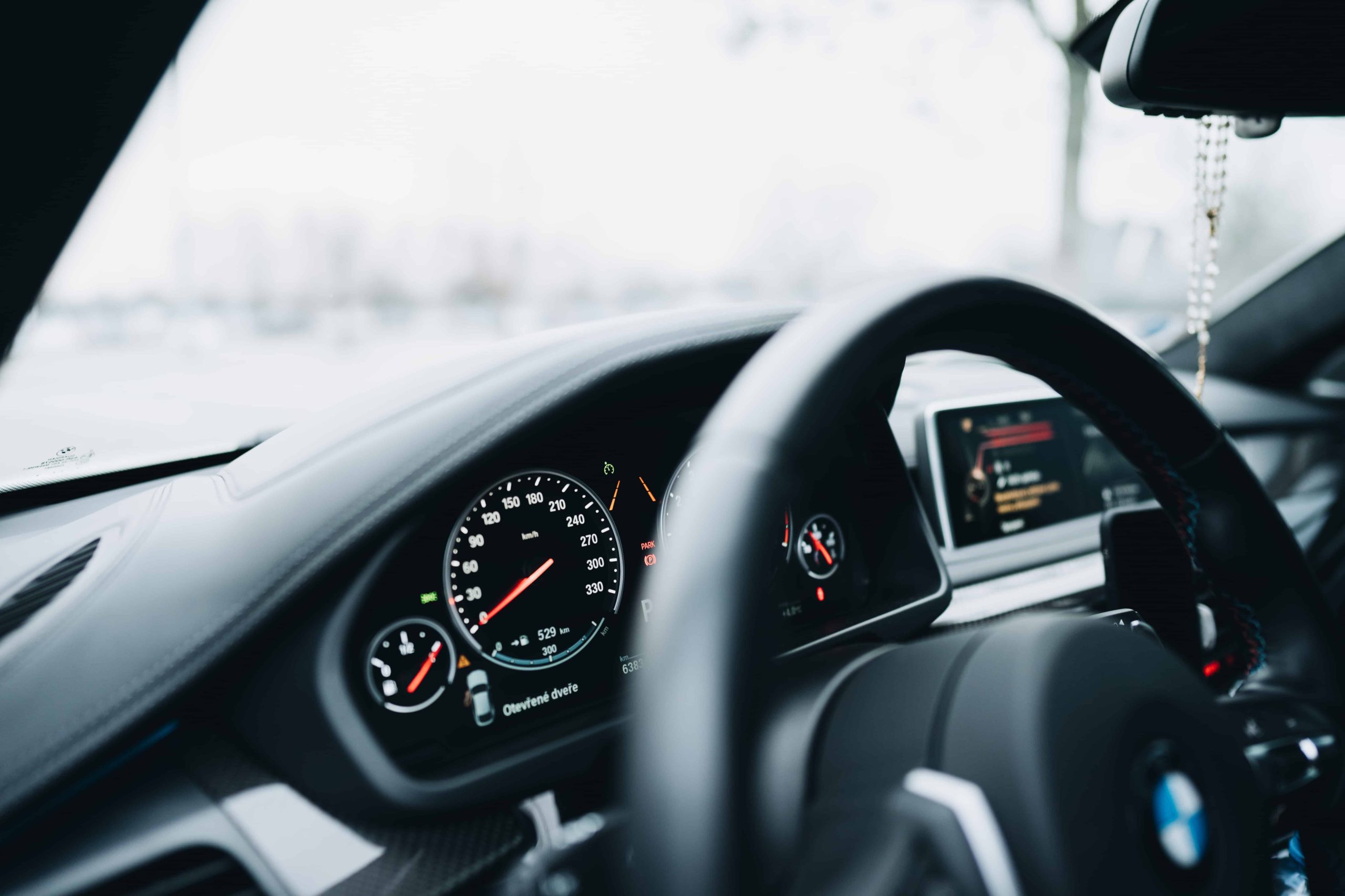 car dashboard pic tips to save costs on car insurance